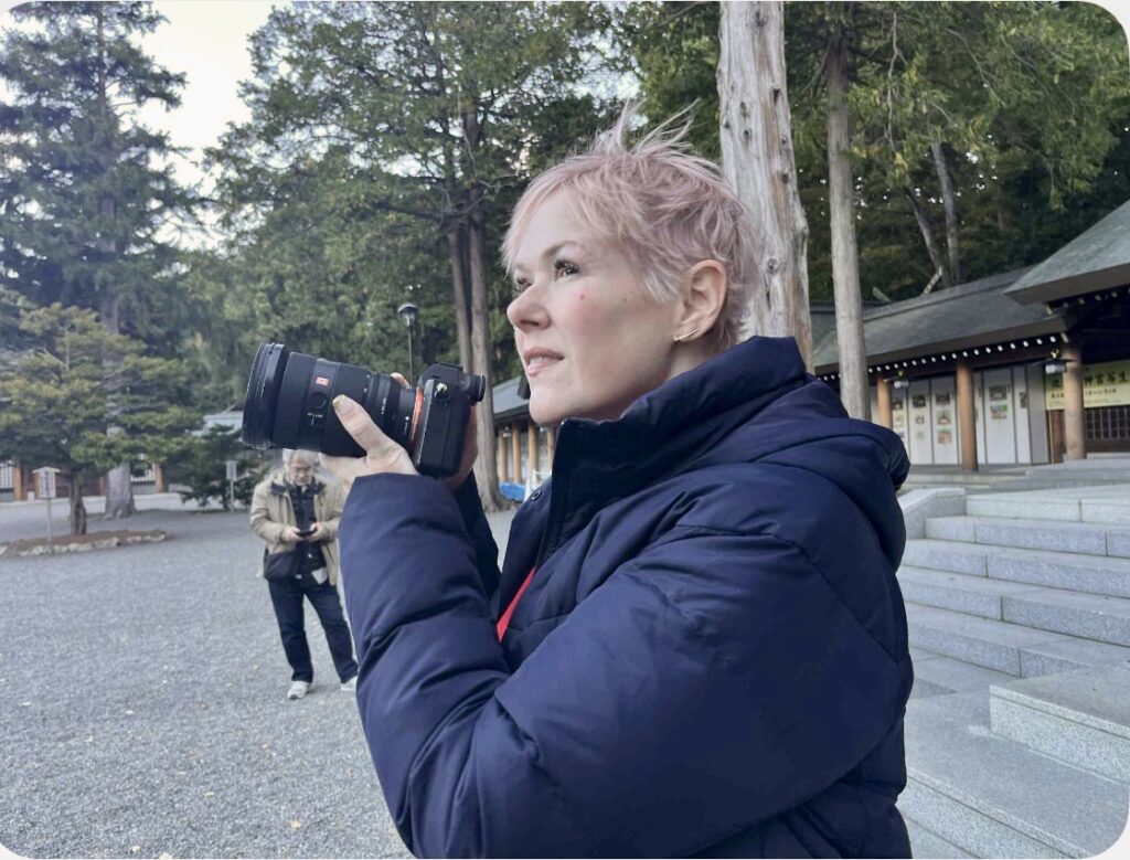 woman holding camera