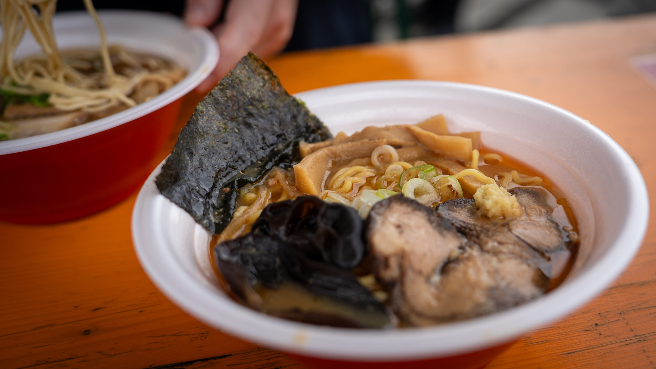 Close-up of a bowl of rich hairy crab miso ramen.