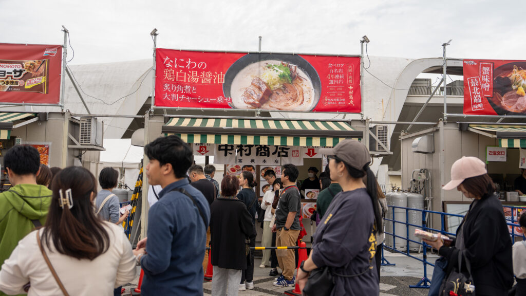 Booth serving Osaka-style chicken white soy sauce ramen at Tokyo Ramen Festa.