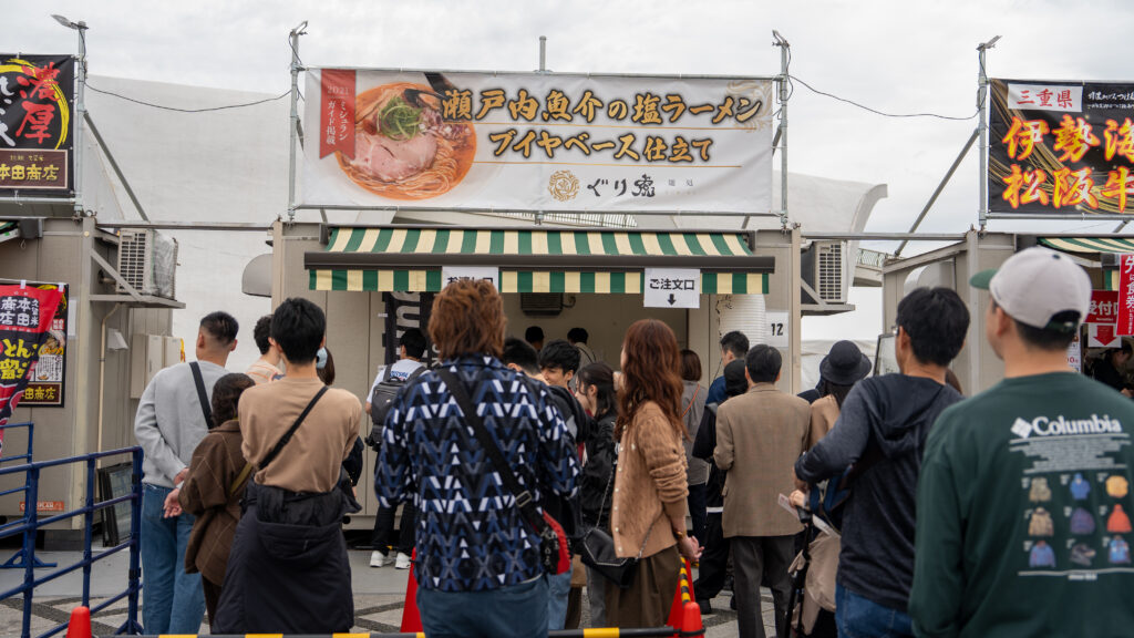 Booth serving Setouchi seafood bouillabaisse-style ramen.