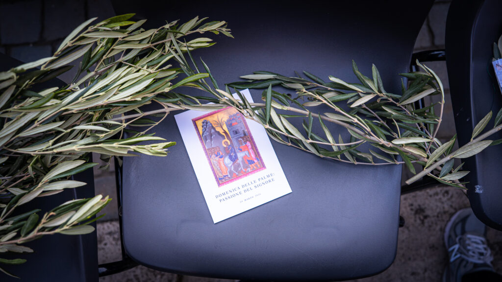 Missalette and olive branch placed on chair at Palm Sunday Mass in St Peter’s Square